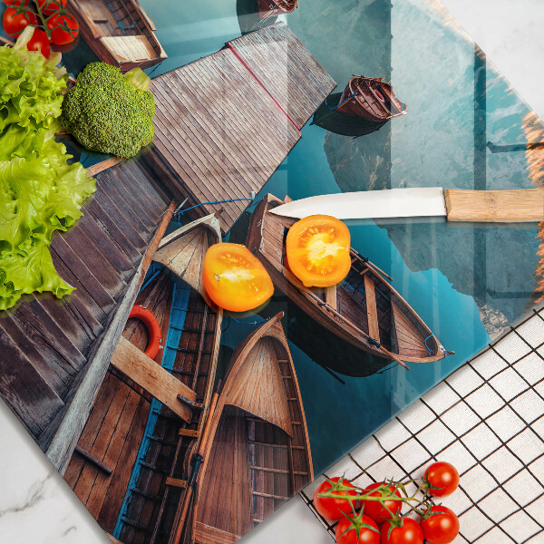 Skärbräda av glas Båtar på sjön