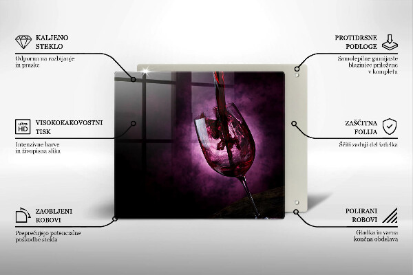 Skärbräda av glas Ett glas vin