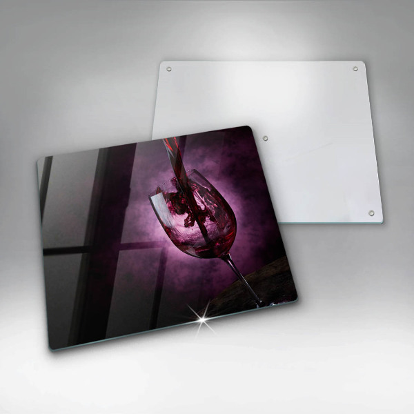 Skärbräda av glas Ett glas vin