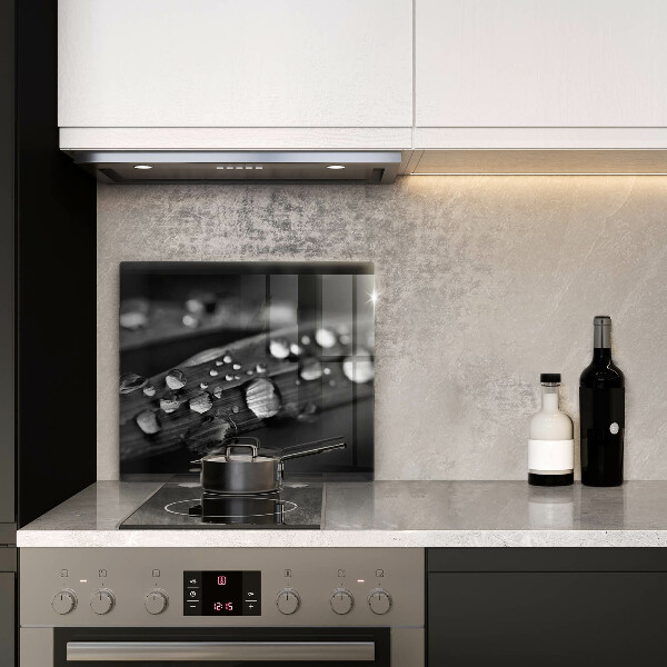 Skärbräda av glas Daggdroppar på löv