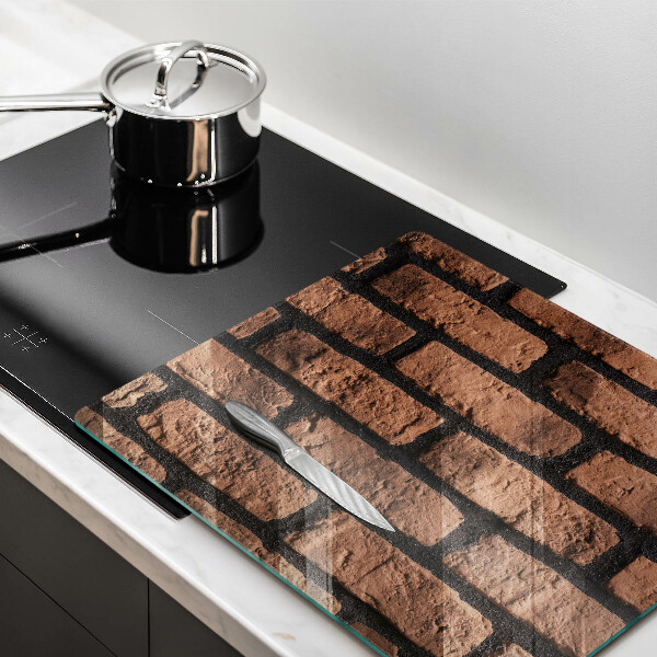 Skärbräda av glas Tegelvägg