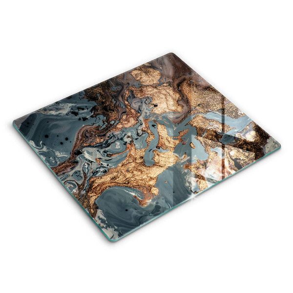 Skärbräda av glas Gyllene stenstruktur