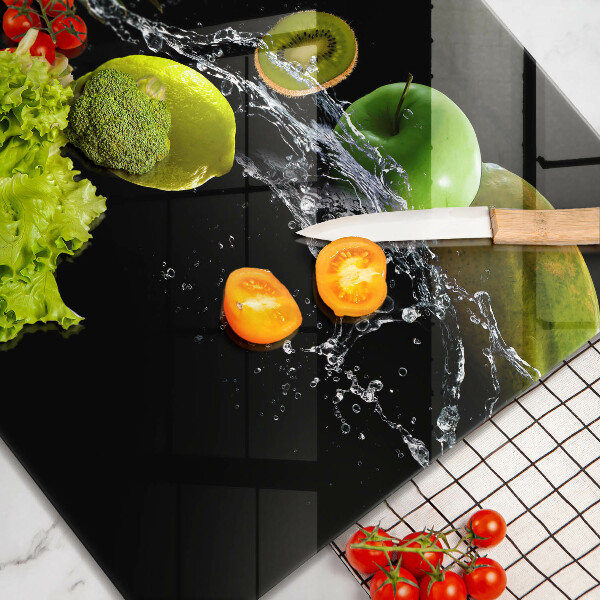 Skärbräda av glas Owoce w wodzie