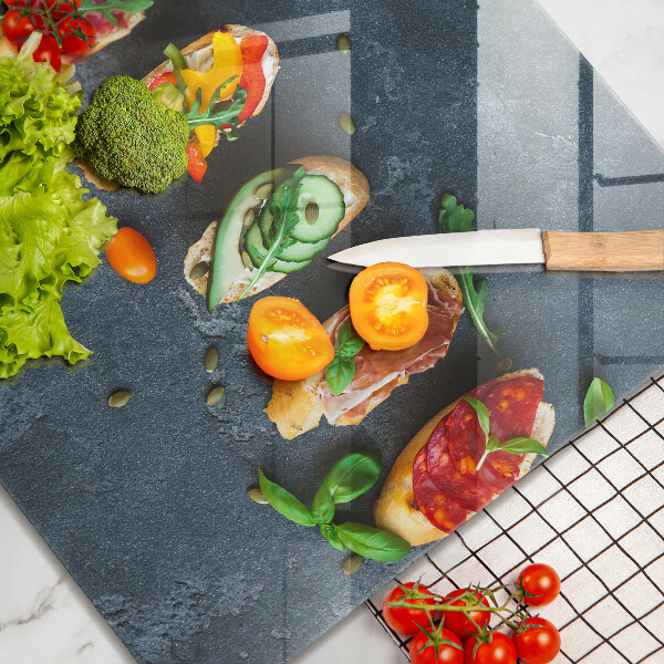 Skärbräda av glas Färgglada smörgåsar