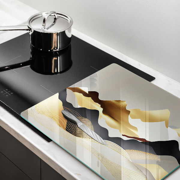 Skärbräda av glas Abstrakta gyllene berg