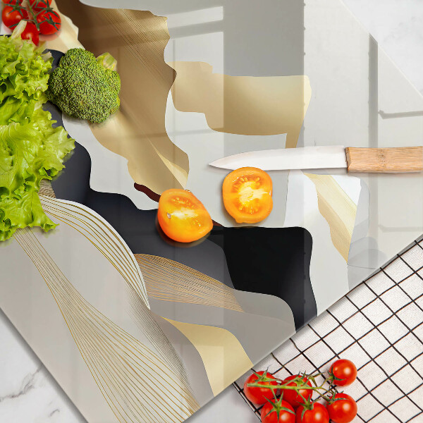 Skärbräda av glas Abstrakta gyllene berg