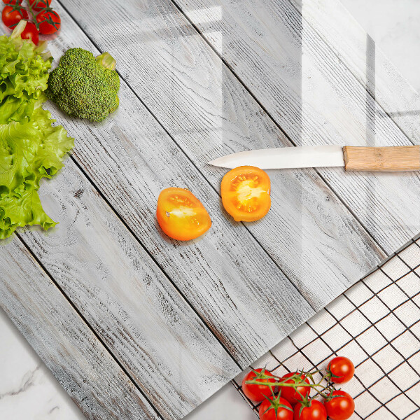 Skärbräda av glas Ljusa träskivor