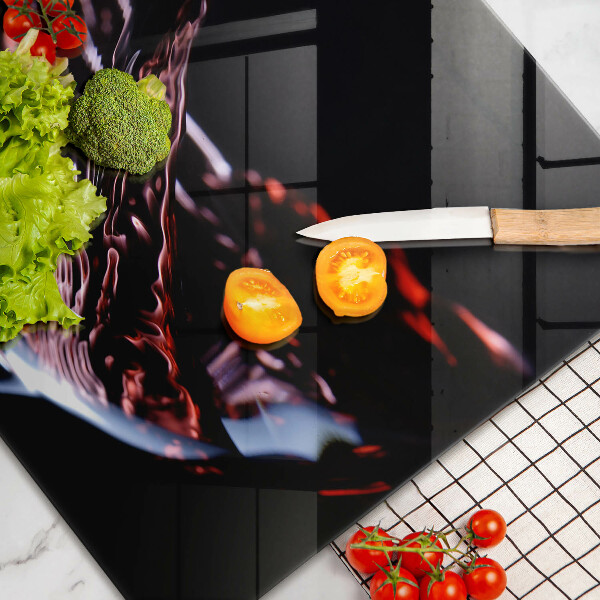 Skärbräda glas modern Ett glas rött vin