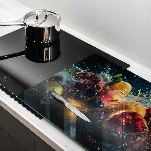 Skärbräda glas modern Frukt i vatten