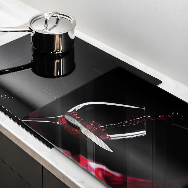 Skärbräda glas modern Ett glas rött vin