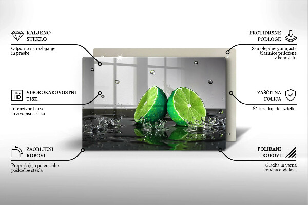 Skärbräda glas modern Saftiga lime och vatten