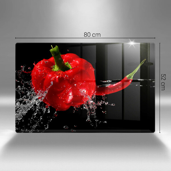 Skärbräda glas modern Röd paprika i vatten