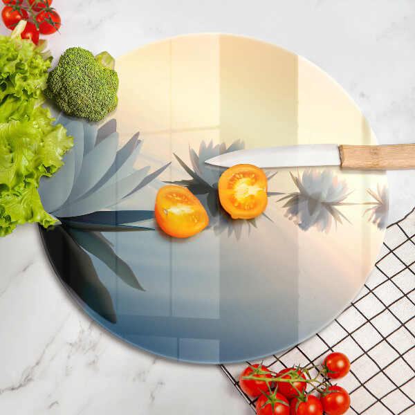 Skärbräda glas unik Lilja blommar på vattnet