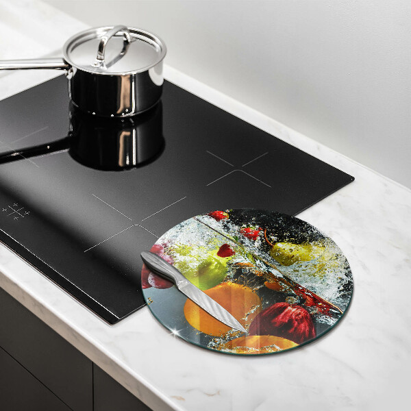 Skärbräda glas unik Saftig frukt i vatten