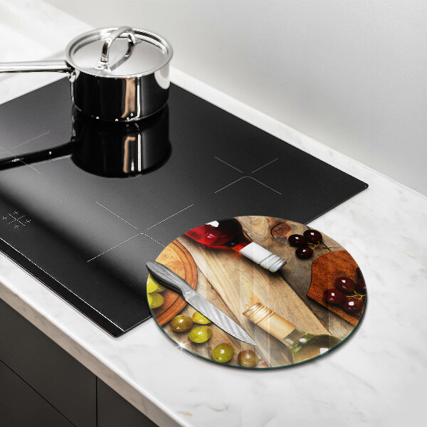 Skärbräda glas unik Vinflaskor och druvor