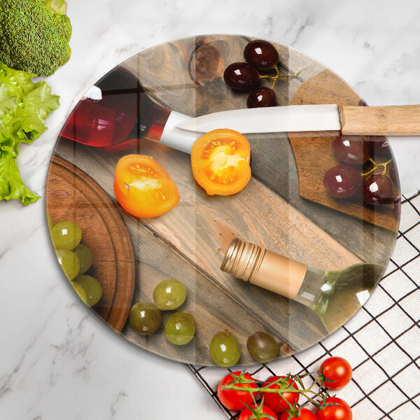 Skärbräda glas unik Vinflaskor och druvor