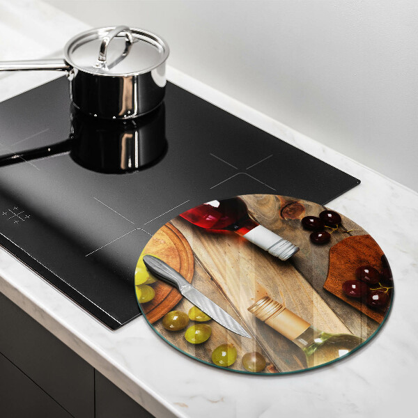 Skärbräda glas unik Vinflaskor och druvor