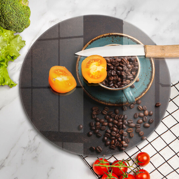 Skärbräda glas unik En kopp kaffebönor