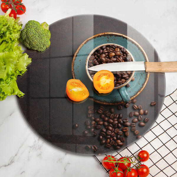 Skärbräda glas unik En kopp kaffebönor