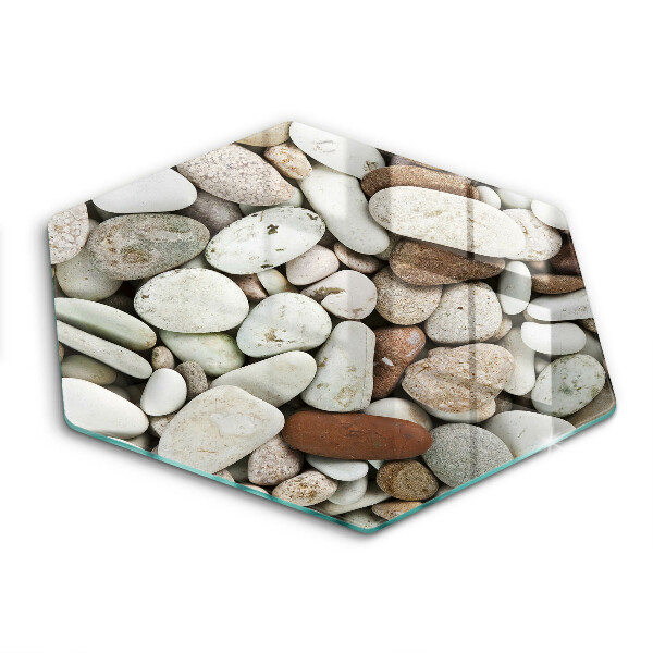 Skärbräda glas sexhörning Små stenar bakgrund