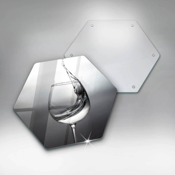 Skärbräda glas sexhörning Ett glas vatten