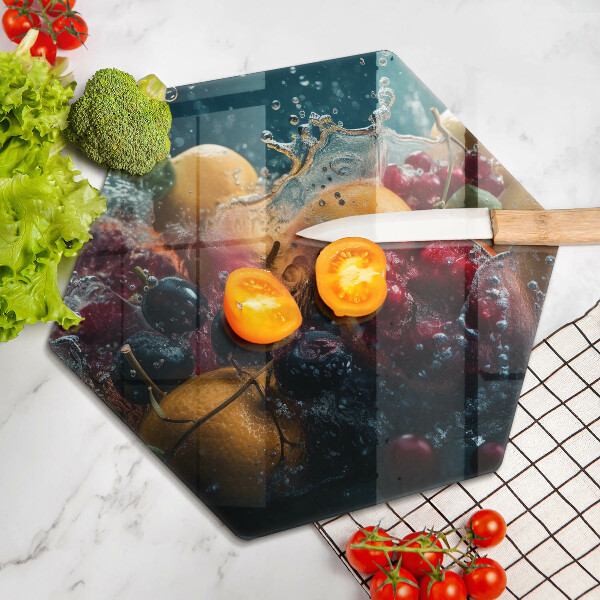 Skärbräda glas sexhörning Frukt i vatten