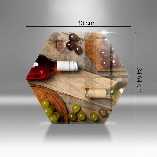 Skärbräda glas sexhörning Vinflaskor och druvor