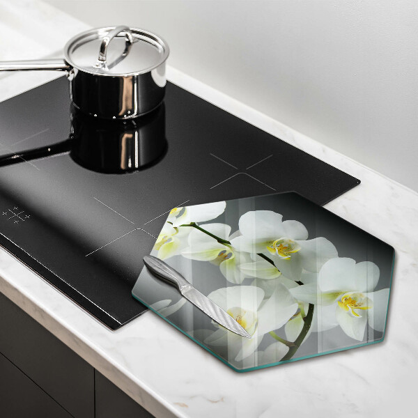 Skärbräda glas sexhörning Vita orkidéblommor