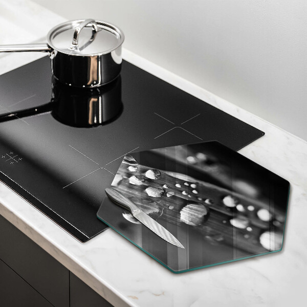 Skärbräda glas sexhörning Daggdroppar på löven