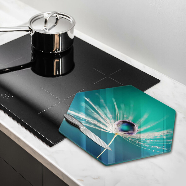 Skärbräda glas sexhörning Dagg på en maskros