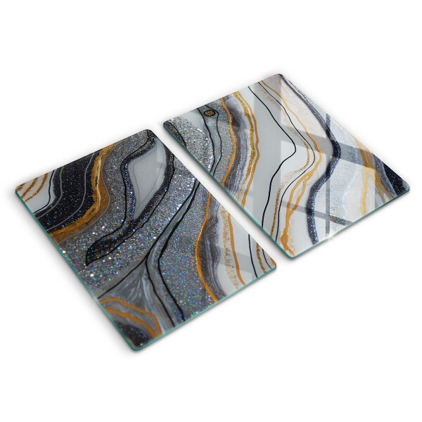 Skydd för induktionsspis sten med guld