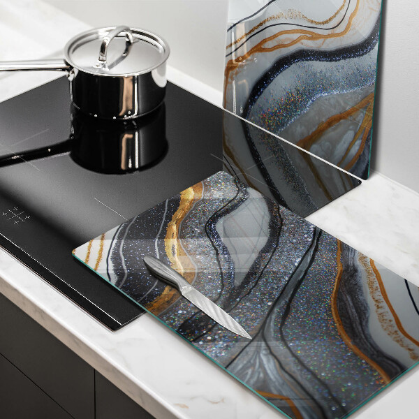 Skydd för induktionsspis sten med guld