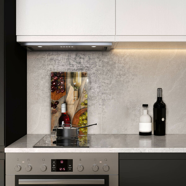 Skydd för induktionsspis modern Vinflaskor och druvor