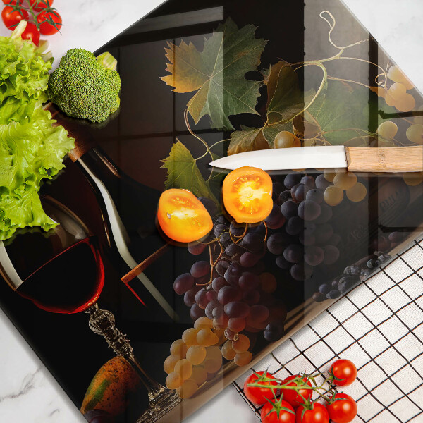 Kokkärlskydd original Ett glas vin och druvor