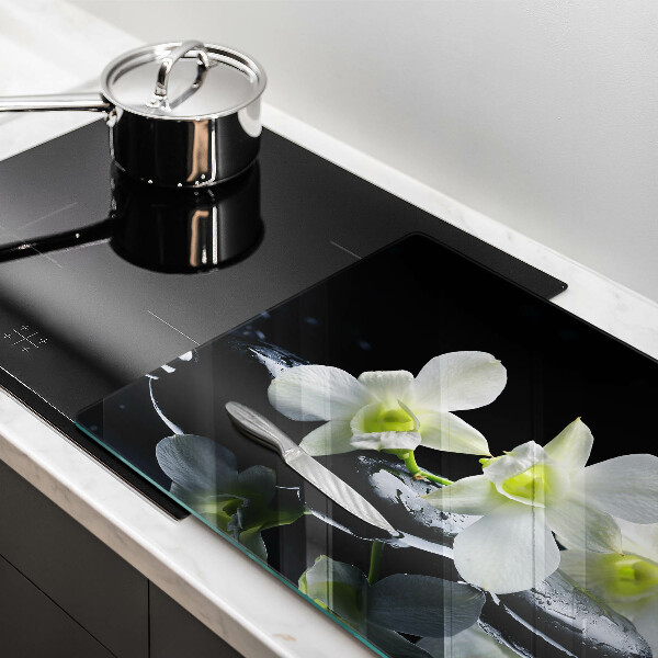 Spisskyddsplatta elegant Vita blommor i Zen vatten