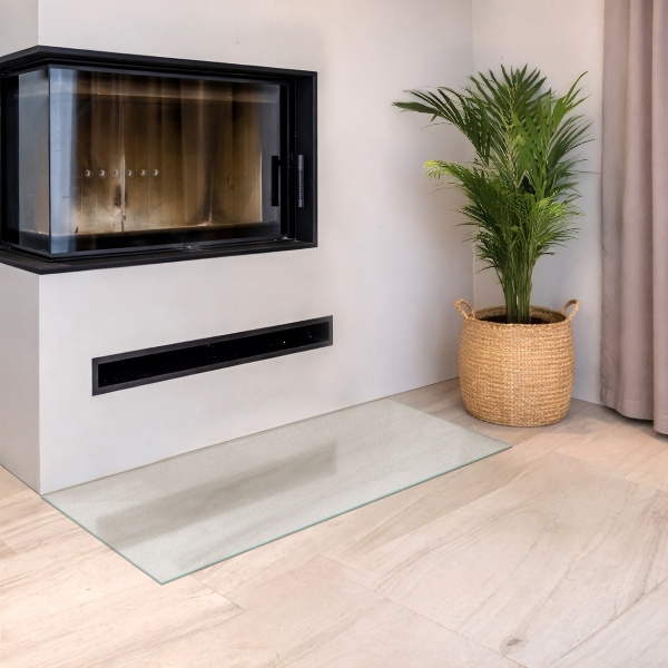 Rektangulär semitransparent glasskiva under kamin 125x50 cm