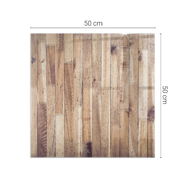 Kvadratisk glasskiva framför öppen spis Träplank i mönster