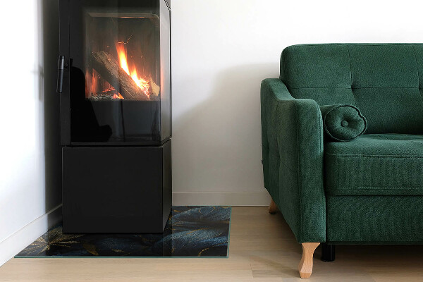 Kvadratisk glasskiva under kamin Eleganta blad i textur