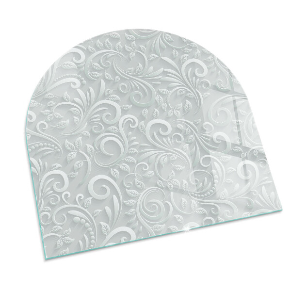 Halvoval glasskiva under kamin Elegant växtmönster