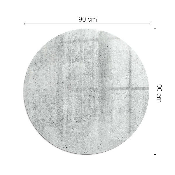 Runda glasskiva framför öppen spis Rå betongstruktur