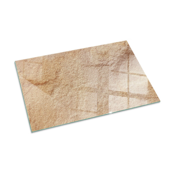 Rektangulär glasskiva framför öppen spis Struktur av natursten