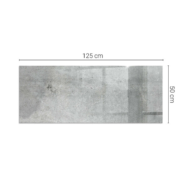 Rektangulär glasskiva framför öppen spis Textur av rå betong