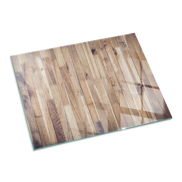 Rektangulär glasskiva framför öppen spis Träplank i mönster