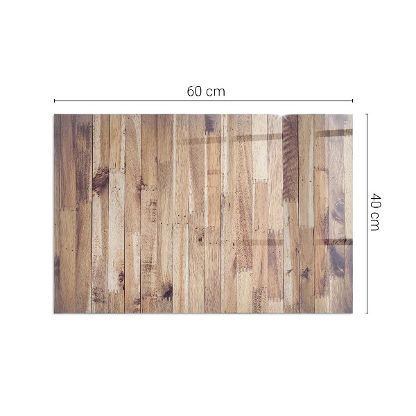 Rektangulär glasskiva framför öppen spis Träplank i mönster