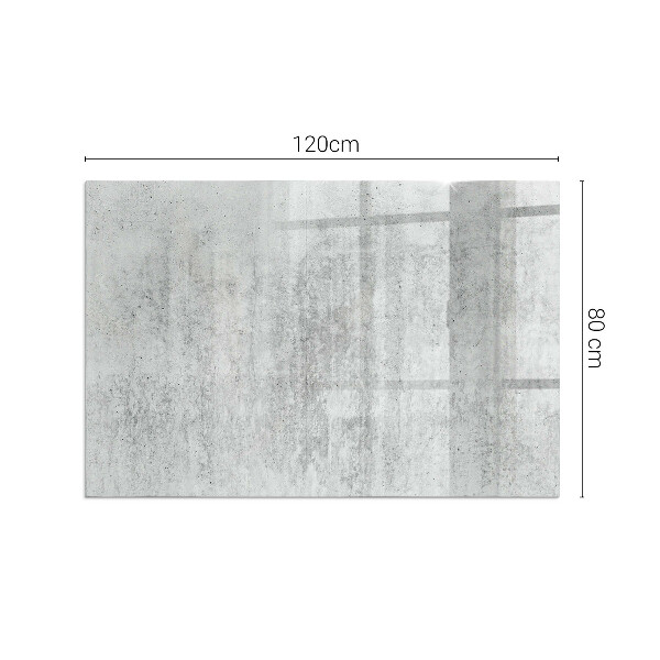 Rektangulär glasskiva under braskamin Rå betongstruktur