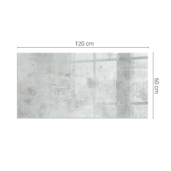 Rektangulär glasskiva framför öppen spis Rå betongstruktur