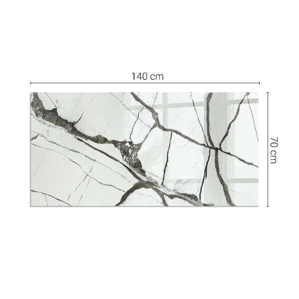 Rektangulär glasskiva framför öppen spis Marmorådringar