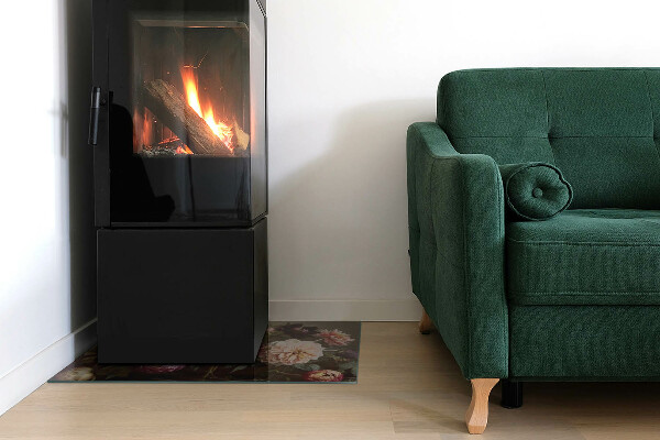 Rektangulär glasskiva under braskamin Blombukett i detalj