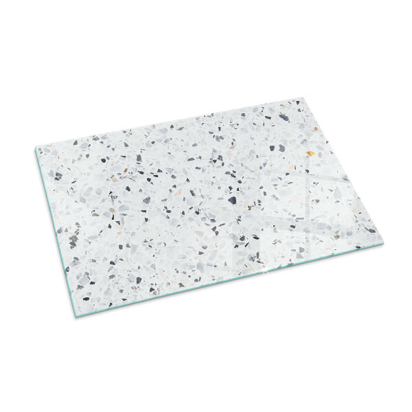 Rektangulär glasskiva under braskamin Stenmönster med små partiklar