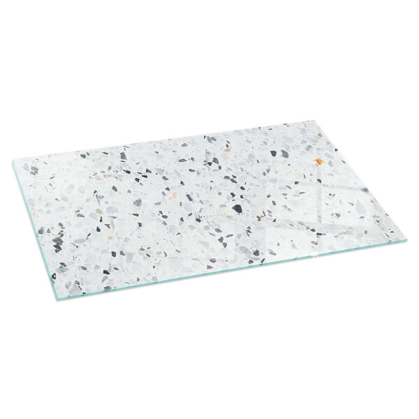 Rektangulär glasskiva under braskamin Stenmönster med små partiklar